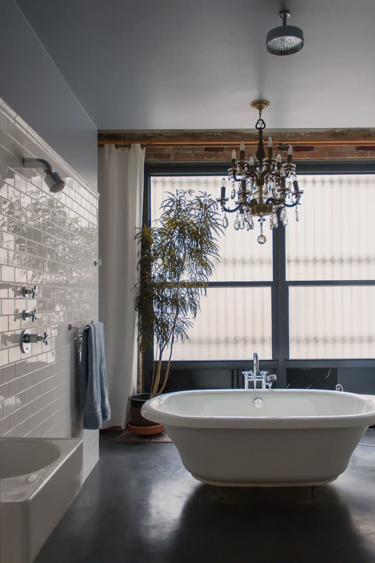 Fancy Bath Lighting Inspiration and Tips for Hanging a Chandelier Over the Bathtub Apartment Therapy